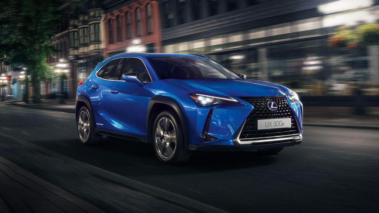 Lexus UX 300e driving through a city location